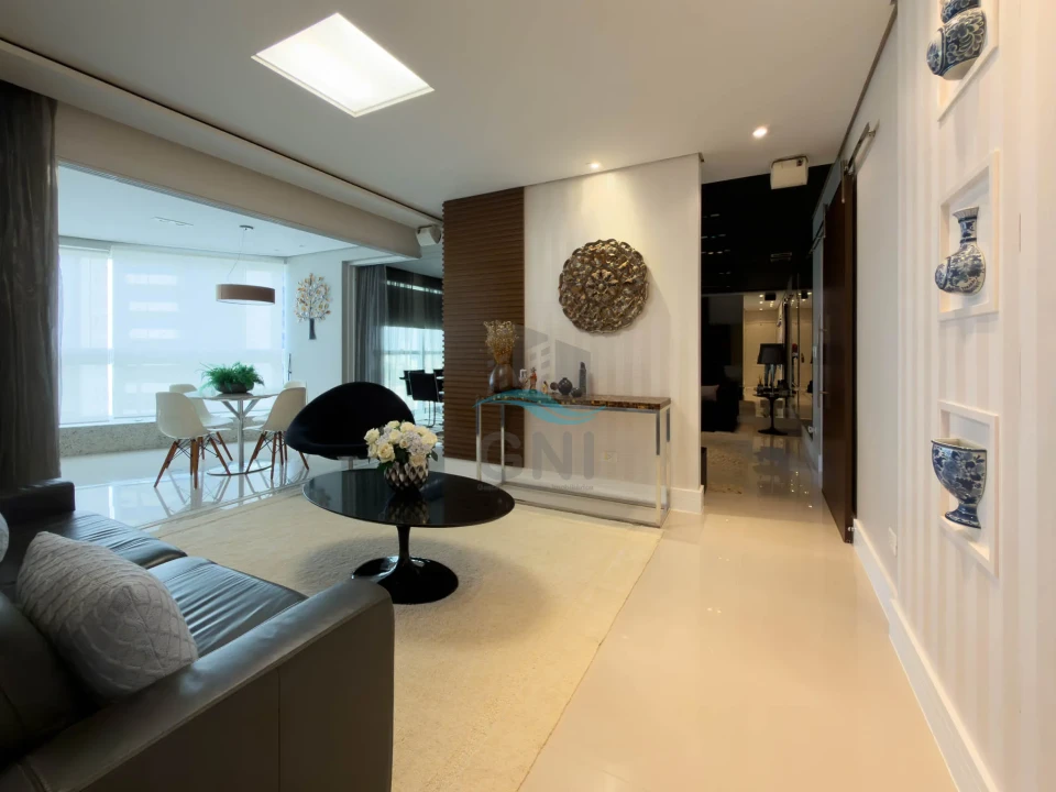 Living integrado do apartamento no Edifício Palazzo Di Cesare